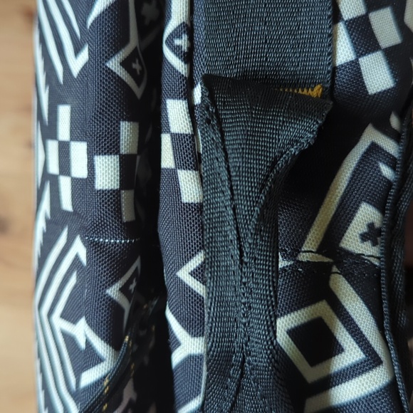 Focused Space. Unisex Tribal Print Backpack. Zippered Front Pocket. - Picture 13 of 14